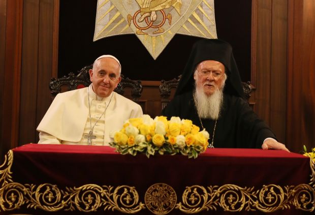 Pope Francis and Ecumenical Patriarch Bartholomew of Constantinople sit during signing of joint declaration at the patriarchal Church of St. George in Istanbul in this Nov. 30, 2014 file photo. (CNS photo/Grzegorz Galazka, pool)