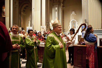Archbishop Charles Chaput processes into the annual Hispanic Heritage Mass at the Cathedral Basilica of SS. Peter & Paul in Philadelphia Oct. 9. Photo by Kevin Cook for the Catholic Standard & Times.