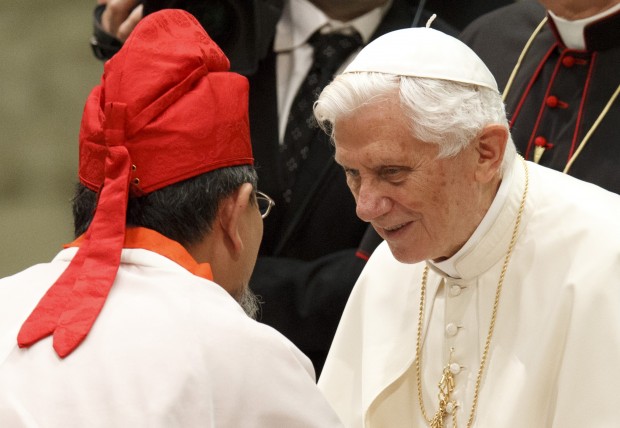 Pope Benedict XVI meets a delegate from the International Religious Fellowship from Japan during his general audience in Paul VI hall at the Vatican Sept. 5.