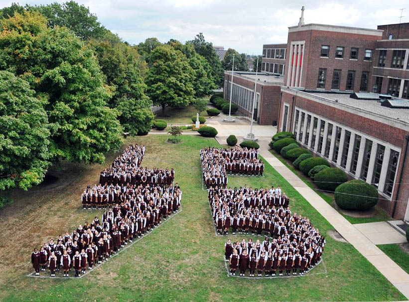 after mass students gathered on the front lawn to spell out LF 75 and sing their alma mater