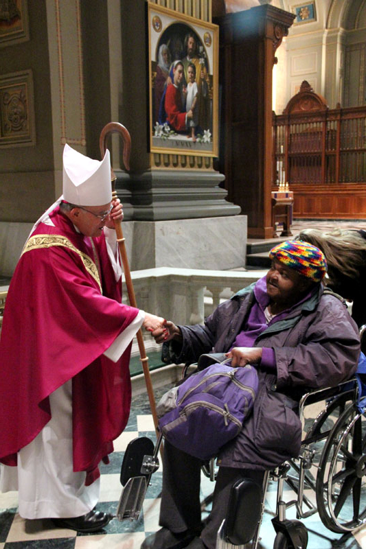Archbisohp Chaput greets Karen Collins after mass AAAAAAAAAAAAAAAAAAAAAAAAAAAAAAAAAAAAAAAAAAAAAAAAAAAAAAAAAAAAAAAAAAAAAAAAAAA