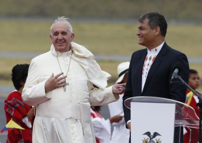 Pope Francis talks with Ecuadorean President Rafael Correa upon his arrival at Mariscal Sucre International Airport in Quito, Ecuador, July 5. (CNS photo/Paul Haring) 