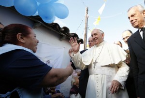 Pope Francis meets with people of  Banado Norte, a poor neighborhood in Asuncion, Paraguay, July 12. (CNS photo/Paul Haring) (CNS photo/Paul Haring) See VATICAN-LETTER July 16, 2015.