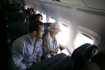 Florida pilgrims look out the plane window Sept. 18 on their way to Cuba to see Pope Francisin Cuba. (CNS photo/Tom Tracy) 