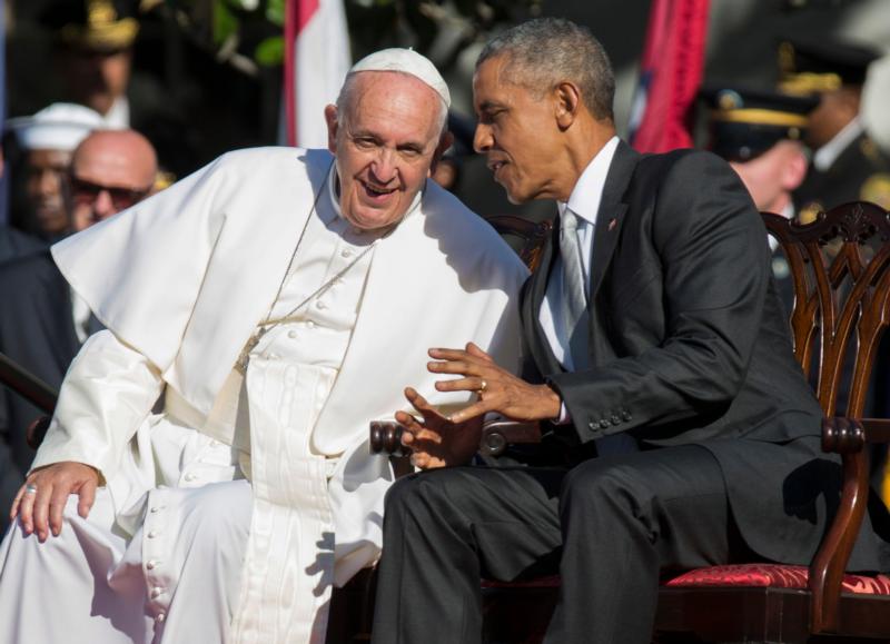 U.S. President Barack Obama speaks to  Pope Francis during an arrival ceremony on the South Lawn of the White House in Washington Sept. 23. (CNS photo/Joshua Roberts) See POPE-WHITE-HOUSE Sept. 23, 2015.