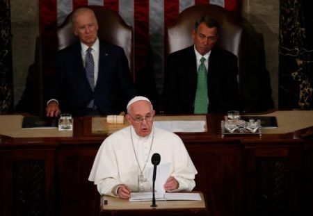 Pope Francis addresses a joint meeting of the U.S. Congress as Vice President Joe Biden (left) and Speaker of the House John Boehner look on in the House of Representatives Chamber at the U.S. Capitol in Washington Sept. 24. (CNS photo/Paul Haring) See POPE-CONGRESS Sept. 24, 2015.