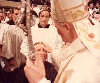 Augustinian Father William Atkinson, a lifelong Delaware County resident, in 1974 became the first quadriplegic priest to be ordained for the Catholic Church. Here, he is blessed by Pope John Paul II. (Photo courtesy  fatherbillatkinson.com)