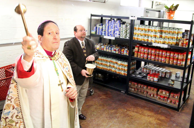 Bishop John McIntyre blesses the newly designed Martha's Choice Marketplace.