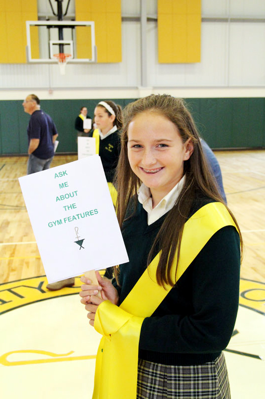 Katie Kelly and her fellow students were on hand to tell guests about the features of the new gym.
