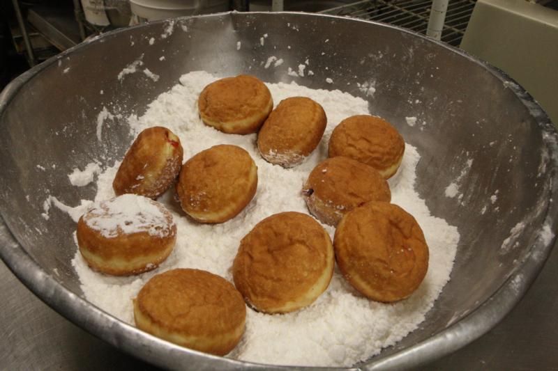 Polish-style doughnuts, known as "paczki," are seen in a bowl Jan. 18 at Kiedrowski's Simply Delicious Bakery in Amherst, Ohio, before being covered with powdered sugar. The doughnuts are a tradition in the days before Lent. (CNS photo/Dennis Sadowski)