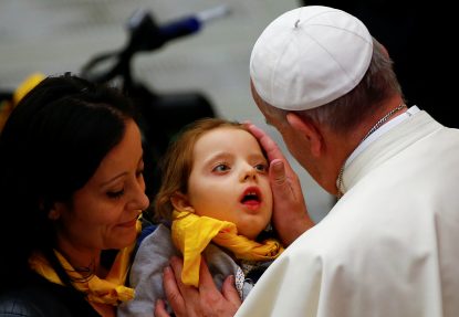 Pope Francis blesses a child during a special audience with members of Doctors with Africa at the Vatican May 7. (CNS photo/Tony Gentile, Reuters)