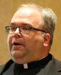 Father Philip Bochanski, associate director of Courage International, speaks about his ministry to homosexuals at a meeting in Warrington, England, in this February 2016 file photo. (CNS photo/Simon Caldwell)