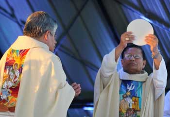 Cardinal Charles Bo of Yangon, Myanmar, celebrates Mass in Cebu, Philippines, Jan. 12. The southeast Asian cardinal called for keeping the country's natural resource wealth away from "cronies, companies and countries nearby."(CNS/Roy Lagarde) 