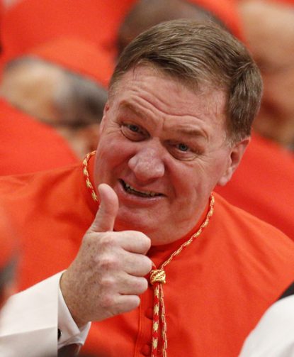 New Cardinal Joseph W. Tobin of Indianapolis gives a thumbs up as he arrives for a consistory in St. Peter's Basilica at the Vatican Nov. 19. (CNS photo/Paul Haring) 