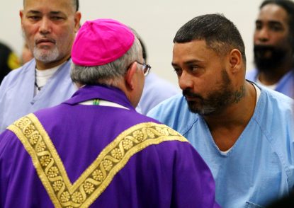 Prisoners chat with Archbishop Chaput during his Dec. 15 visit to Curran-Fromhold. (Sarah Webb)