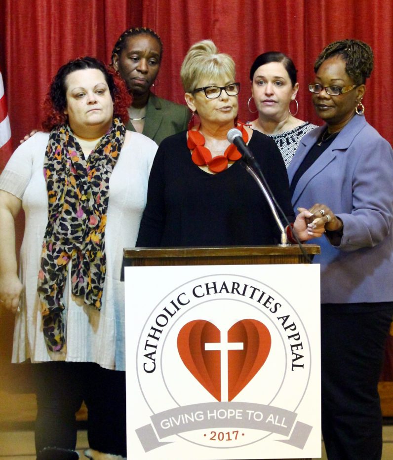 Speaking of the Catholic Social Services-run programs to address the opioid addiction crisis in Philadelphia is Amy Stoner center), with support by from left) Women of Hope resident Patricia Speakman; Renee Hudson-Small, assistant director of the CSS Housing and Homeless Division; Kate Baumgardner, division director; and Bonita Pritchette, an an alumna of Women of Hope. Sarah Webb)