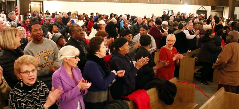 Everyone in the congregation sing along to hymns led by the Philadelphia Catholic Mass Choir at the 34th annual Archdiocesan Gathering in honor of Rev. Dr. Martin Luther King Jr. Jan. 16 at St. Philip Neri Church, Lafayette Hill.