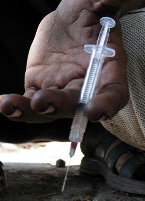 The syringe of a heroin addict is seen in an undated photo. (CNS photo/Akhtar Soomro, EPA) 