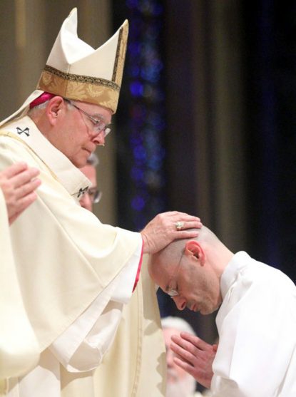 Archbishop Charles Chaput ordains Olindo Mennilli a permanent deacon for the Archdiocese of Philadelphia in June 2016. (Sarah Webb)