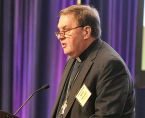 Cardinal Joseph W. Tobin of Newark, N.J., speaks June 14 of the opening day of the U.S. Conference of Catholic Bishops' annual spring assembly in Indianapolis. (CNS photo/Sean Gallagher, The Criterion) 