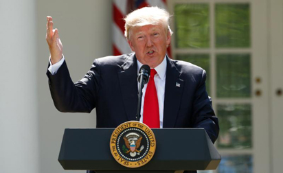 U.S. President Donald Trump announces his decision that the United States will withdraw from the landmark Paris climate agreement June 1 in the Rose Garden of the White House in Washington. (CNS photo/Kevin Lamarque, Reuters)