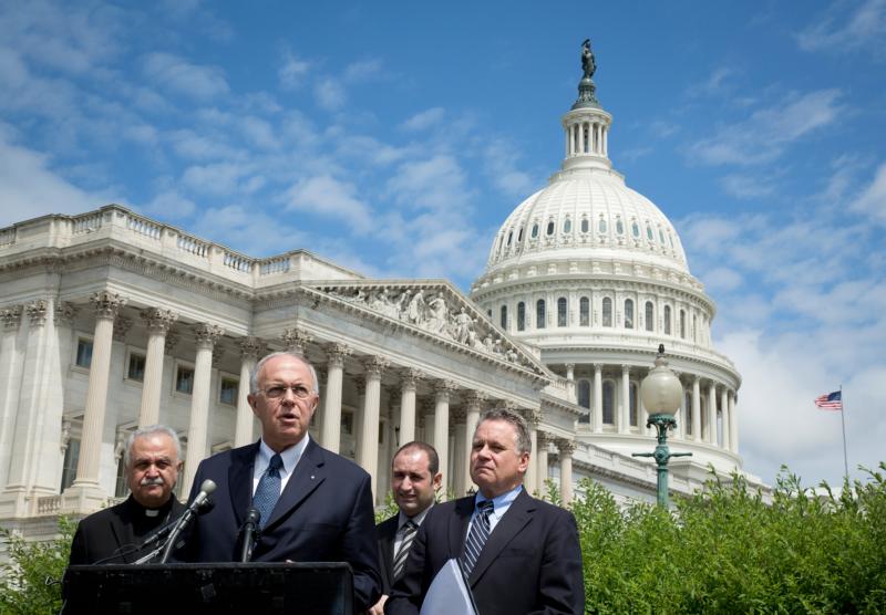 Supreme Knight Carl Anderson, CEO of the Knights of Columbus, speaks near the U.S. Capitol in Washington June 7. He, along with members of Congress, expressed support for the bipartisan Iraq and Syria Genocide Emergency Relief and Accountability Act. (CNS photo/Tyler Orsburn) 