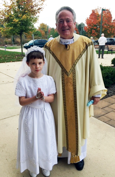 First Communion dresses suits find new life in parish program