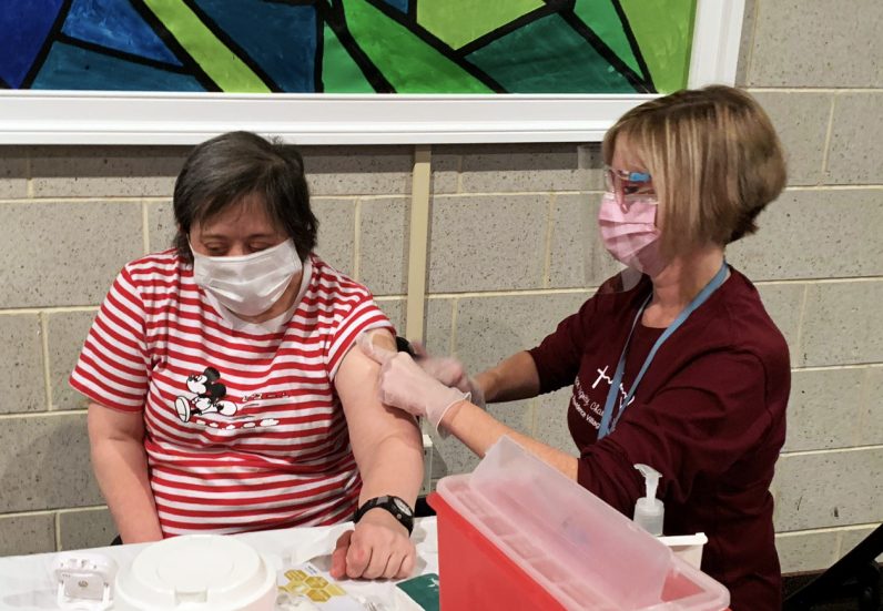 A dose of hope: Vaccine reaches frontline workers, clients - CatholicPhilly