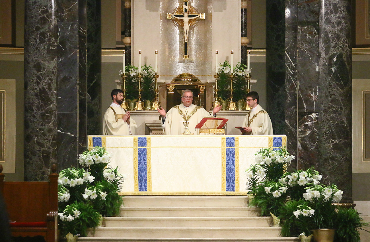 Scenes from the Easter Vigil Mass at the cathedral Catholic Philly
