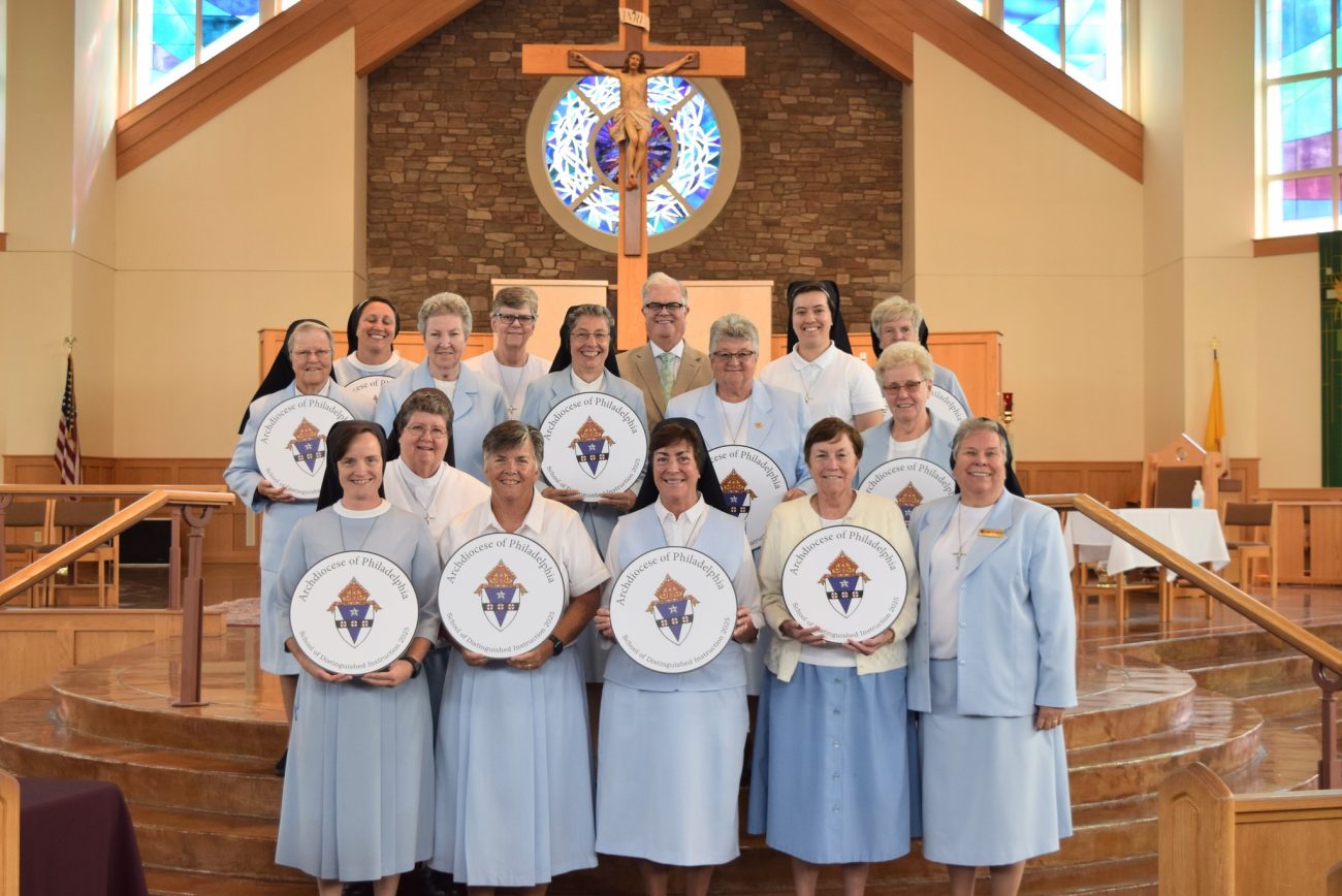 Dr. Andrew McLaughlin (center, top) and Sister Margaret Rose Adams (far right) pose with IHM school leaders honored as 2025 Archdiocesan Schools of Distinguished Instruction.