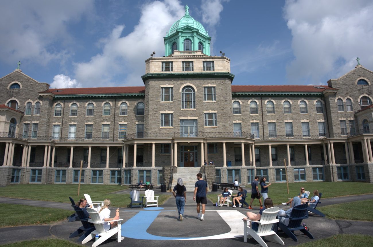 Students walk across Immaculata University campus during fall 2025 semester