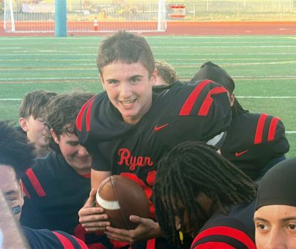 Archbishop Ryan sophomore Thanas Strati is carried on the shoulders of his teammates after kicking the game-winning field goal in a 3-0 win that clinched the Philadelphia Catholic League Blue Division championship Oct. 18 at Northeast High School, Philadelphia. (Photo by John Knebels)
