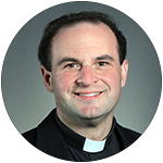 Father Eric J. Banecker